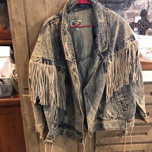 Blue denim jean jacket with leather fringe